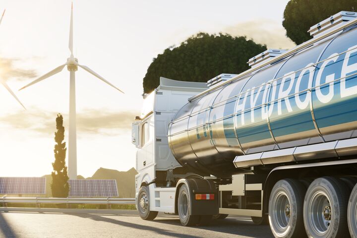 Truck on road with H2 Hydrogen logo. Renewable or sustainable electricity. Clean alternative ecological energy. 3D rendering.