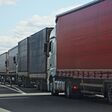 trucks, convoy, asphalt, automobile, awning, camouflage, car, cargo, check, congestion, container, control, controller, day, delivery, eac, europe, european, examination, export, freight, heavy truck, highway, import, inspection, inspector, line, load, logistic, logistics, lorry, motor, overload, platon, queue, road, sanctions, semi, semi-trailer, spring, traffic, trailer, transit, transport, transportation, travel, trucking, vehicle, weight, white
