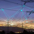 High power electricity poles in urban area connected to smart grid. Energy supply, distribution of energy, transmitting energy, energy transmission, high voltage supply concept photo.