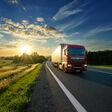truck, trucking, lorry, trailer, car, vehicle, automobile, goods traffic, semi-trailer, semi-truck, freight, haulage, logistic, cargo, delivery, transport, traffic, transit, transportation, conveyance, vehicular, international transport, drive, ride, highway, motorway, road, infrastructure, sun, sunlight, sunset, sunshine, sundown, sunrise, dawn, daybreak, landscape, countryside, nature, environment, meadow, field, rural, tree, summer, sky, cloud, perspective, vanishing point truck trucking lorry trailer car vehicle automobile goods traffic semi-trailer semi-truck freight haulage logistic cargo delivery transport traffic transit transportation conveyance vehicular international transport drive ride highway motorway road infrastructure sun sunlight sunset sunshine sundown sunrise dawn daybreak landscape countryside nature environment meadow field rural tree summer sky cloud perspective vanishing point