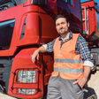 Man logistic transport lorry truck trailer flat bed low platform driver long-haul long-distance cargo freight transportation shipping forwarding conveyance company department trade business commerce logistics loading carrier bulk goods gravel sand broken rock broken stone stones industry industrial commercial professional leaning heavy people Caucasian job work working occupation German Germany orange mann logistik lkw tieflader fahrer lkw-fahrer fernfahrer spedition transport transporte schwertransport fracht geschäft schüttgut sand kies schotter stein sattelkipper industrie industriell kommerziell professionell anlehnen schwer menschen leute beruf arbeit arbeiten job europäisch deutsch deutschland orange