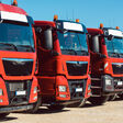 logistic transport cargo freight transportation shipping forwarding conveyance company department trade business commerce logistics loading carrier lorry truck trailer flat bed low platform long-haul long-distance industry industrial commercial professional yard standing row heavy people Caucasian job work working occupation German Germany orange logistic transport cargo freight transportation shipping forwarding conveyance company department trade business commerce logistics loading carrier lorry truck trailer flat bed low platform long-haul long-distance industry industrial commercial professional yard standing row heavy people caucasian job work working occupation german germany orange