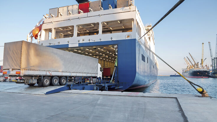 © canaran - stock.adobe.com finance business trucking distribution warehouse delivering merchandise vehicle trailer equipment business travel diesel truck freight transportation motor vehicle harbor land vehicle transportation commercial dock nautical vessel industrial ship ship shipping truck sea trading industry sky demobilization metallic rope moored unloading loading blue steel ro-ro ferry sea freight ferryboat import export mersin turkey mediterranean open logistic tir international