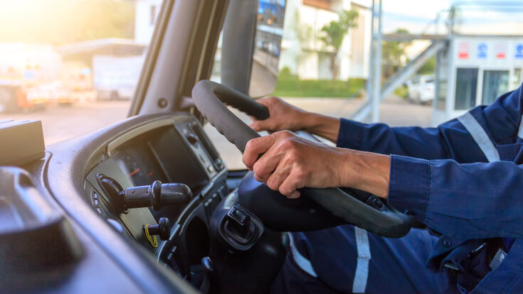 © KM.Photo - stock.adobe.com Truck Wheel business cabin car delivery driver driving freight hand industry inside job logistics male man occupation people person road semi-truck shipping sitting steering trailer transport transportation trucking vehicle worker