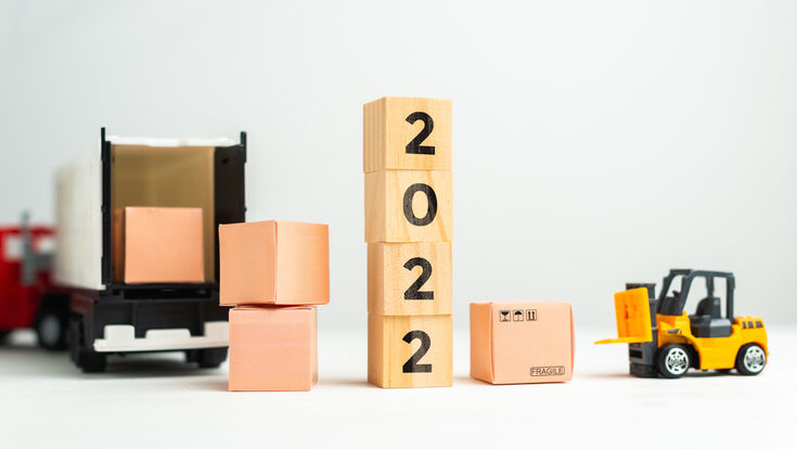 © gesrey - stock.adobe.com 2022 logistics lift transport packaging insurance cargo box delivery supply warehouse year car plane container truck concept goal business success new year start vision new holiday future number strategy begin date