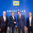 Von links nach rechts: Rüdiger Schulze, Geschäftsführer von Smartlab; Sven Mehringer, Managing Director Energy & Vehicle Services bei DKV Mobility; Dr. Mark Steffen Walcher, Geschäftsführer von Smartlab; Dr. Christoph Ullmer, Leiter Innovationen der Thüga AG.