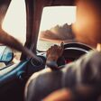 car, driver, driving, vehicle, sunset, man, attention, auto, behind, black, business, caucasian, cruise, dashboard, destinations, hand, human, indoors, inside, journey, motion, motoring, one, people, person, road, seat, speed, steering, traffic, transport, transportation, travel, wheel, male, belt buckle, adult