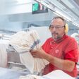 Wie mit einem textilen Putztuch-Service Entsorgungskosten gespart werden können.