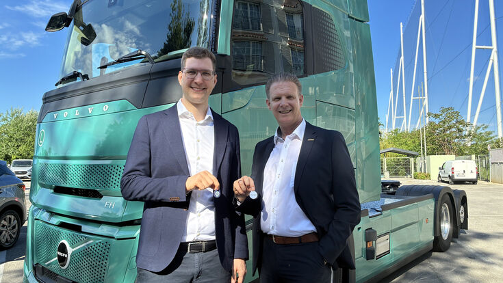 (v.li): Michael Clarke, eTrucker und Thomas Dittrich, SMATRICS